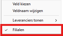 Contextmenu in het Microcash artikelscherm waarbij de optie Filialen rood is omlijnd en aangevinkt. Met deze optie wordt het filiaaloverzicht geopend, waarin de voorraadgegevens van het geselecteerde artikel per filiaal worden weergegeven.